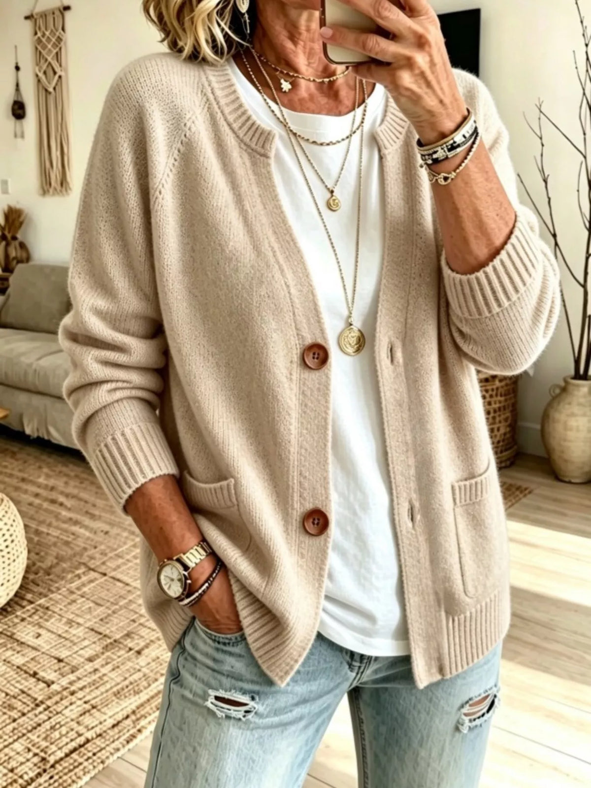 Khaki button-up cardigan with raglan sleeves and patch pockets, ribbed cuffs