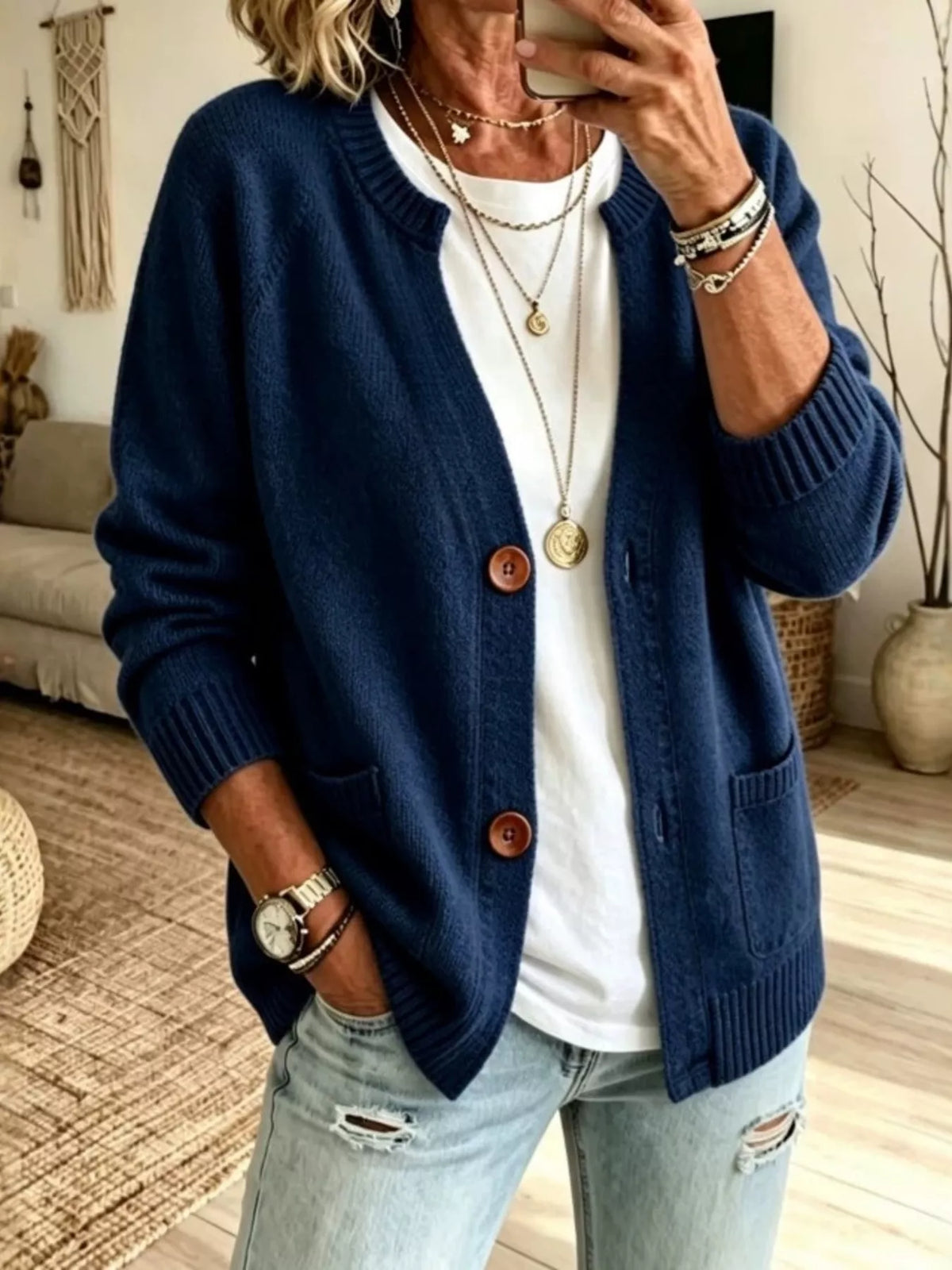 Navy button-up raglan sleeve cardigan with front patch pockets and round wood buttons