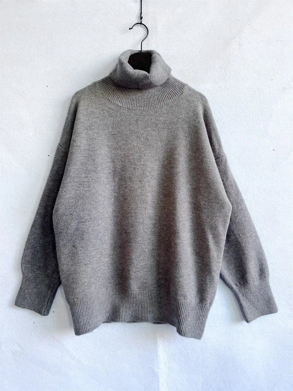 Turtleneck long-sleeve sweater in heather gray, ribbed turtleneck and hem.