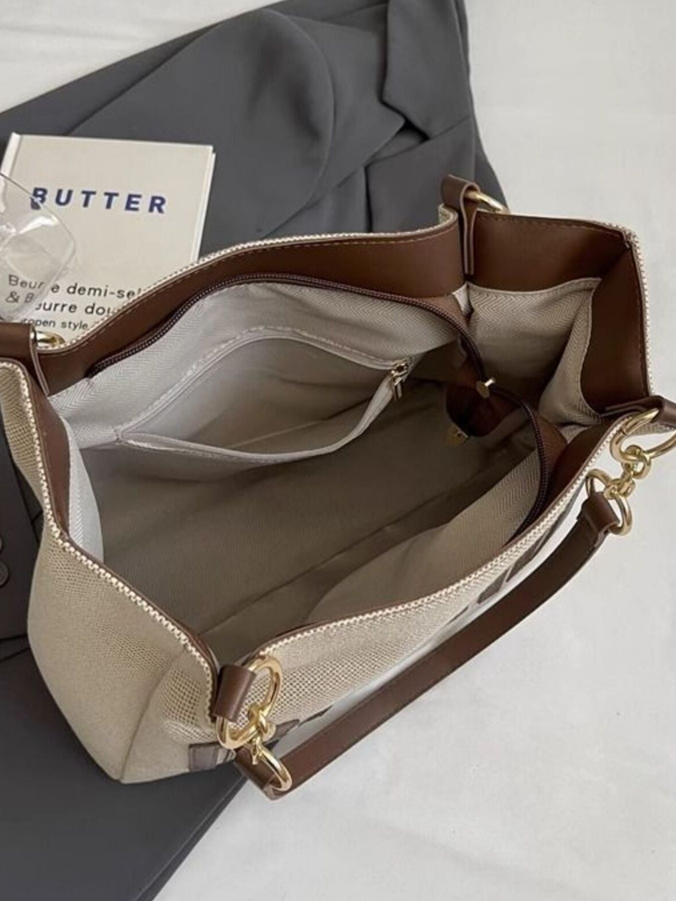 Letter Canvas Shoulder Bag by Trendsi in beige canvas with brown leather trim and gold hardware, medium size