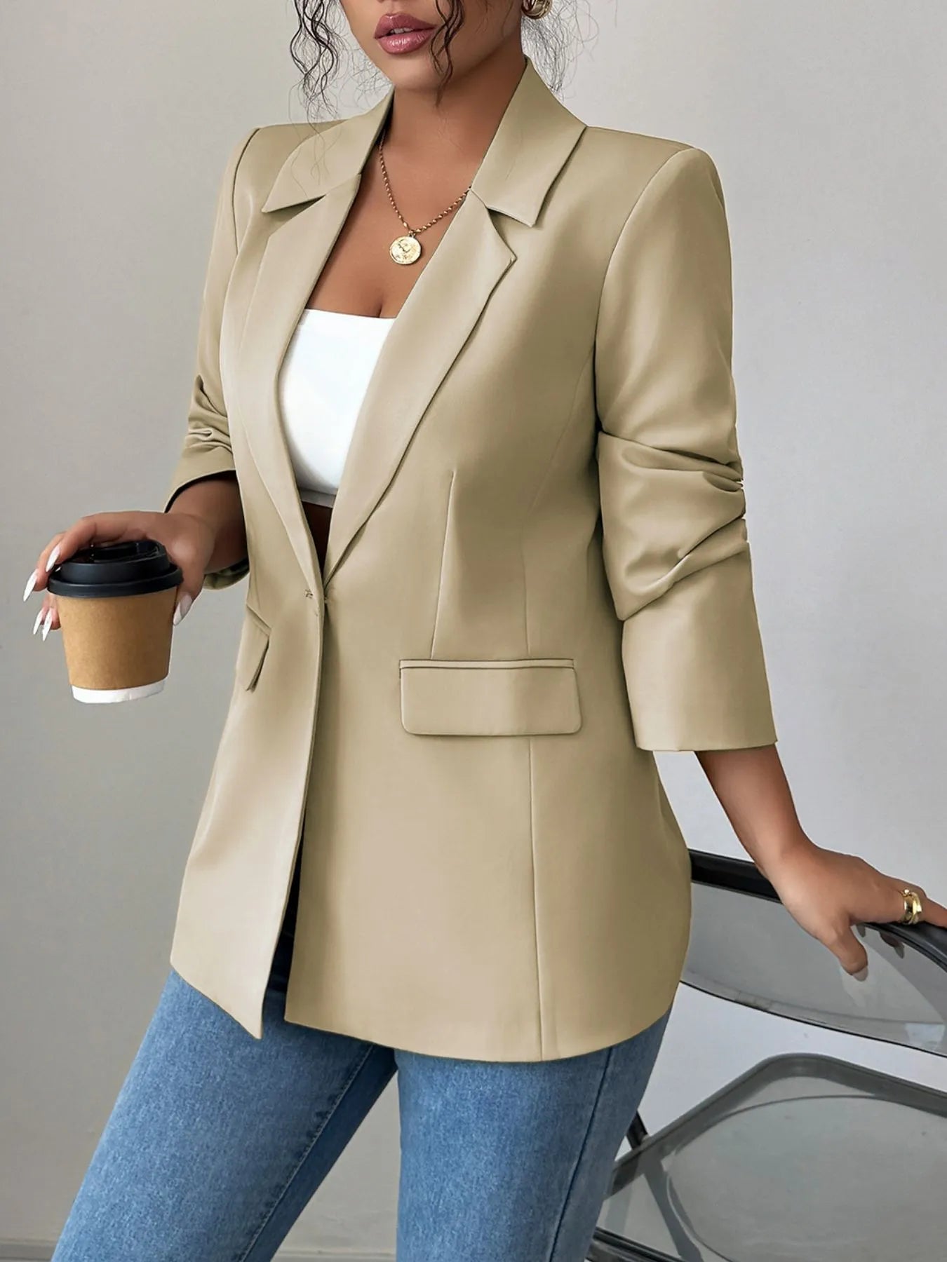 Khaki one-button lapel blazer, structured with single chest pocket