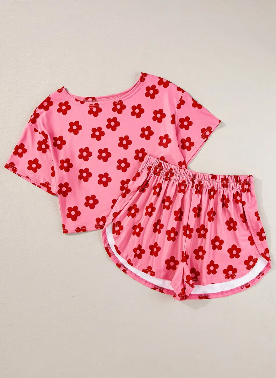 Coral floral cropped tee and matching shorts set, flat lay