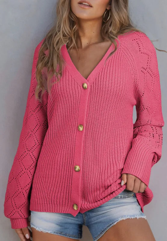 Hot pink openwork V-neck cardigan on model, button front detail