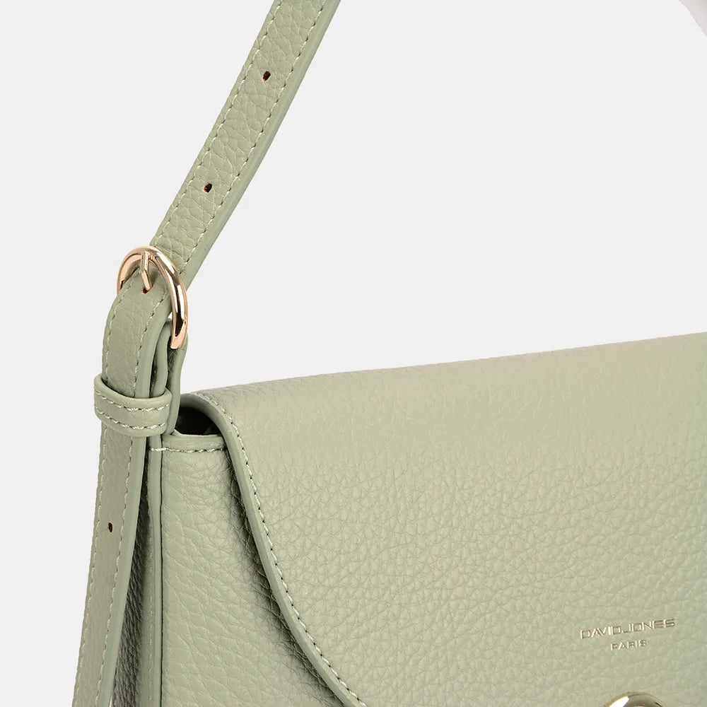 Light olive half-moon shoulder bag close-up of strap stitching and embossed brand mark.
