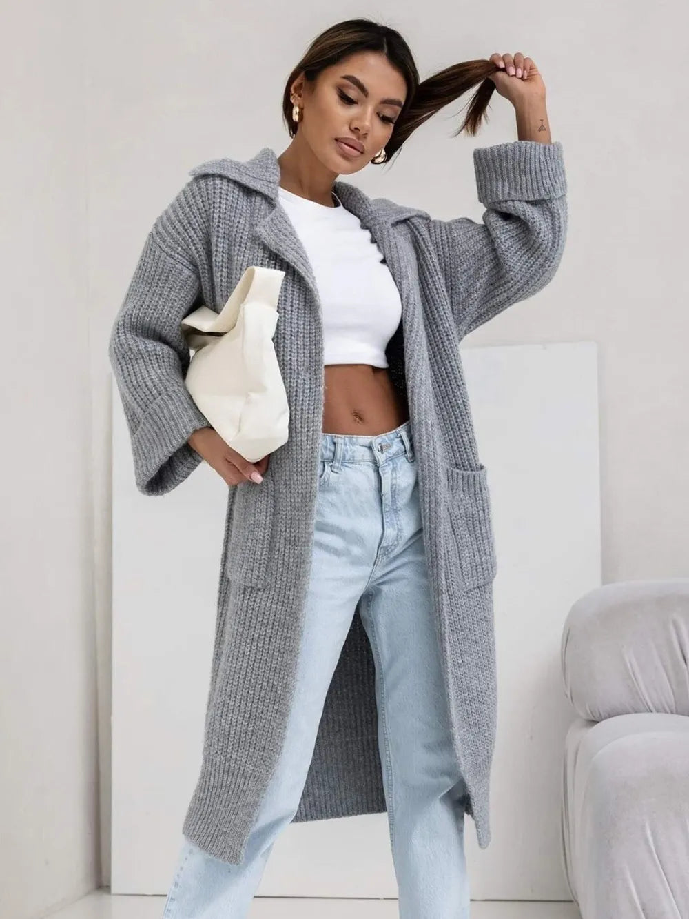 Gray long cardigan sweater with collared neck and side pockets, open front design