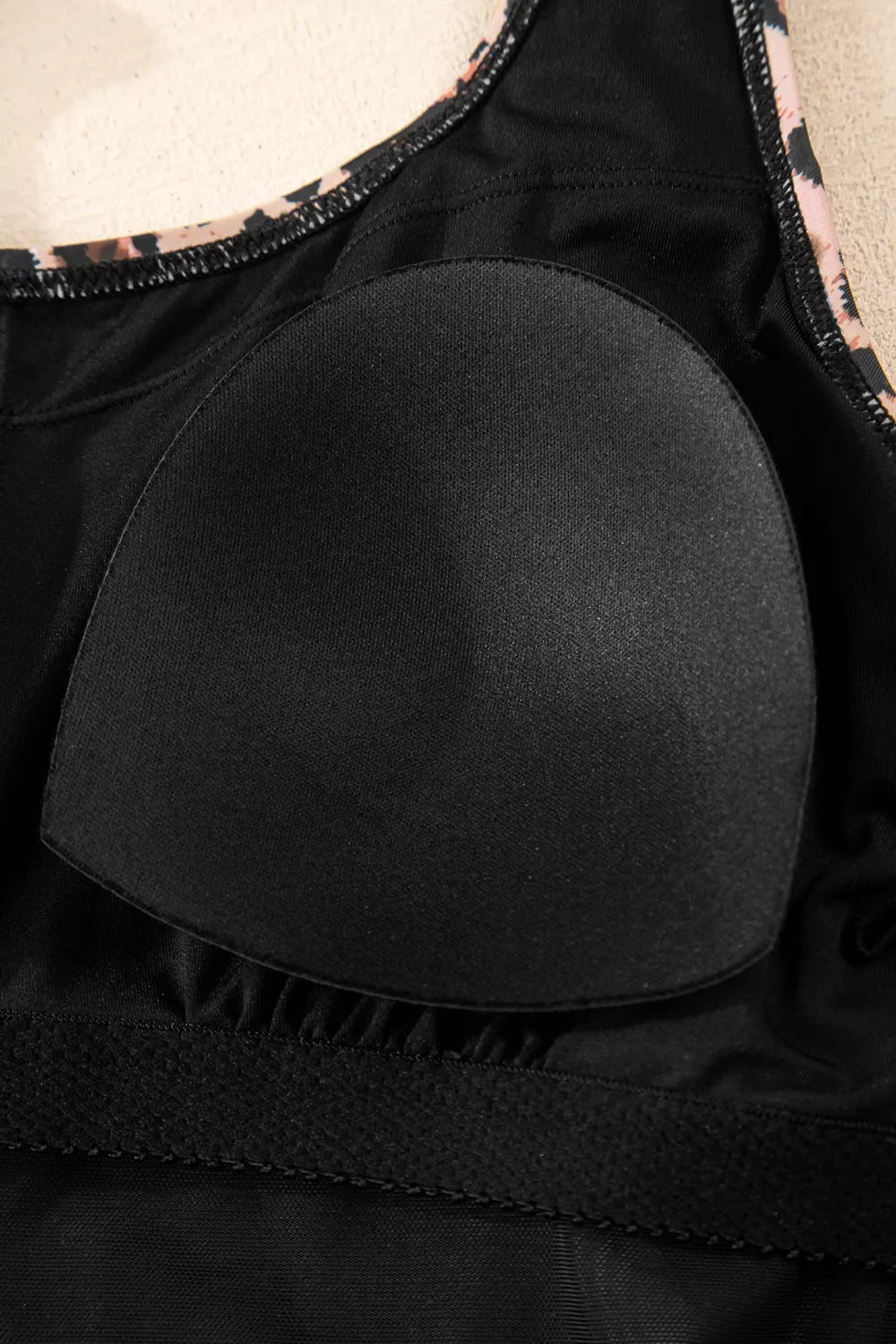 Black mesh V-neck swimsuit with heart-shaped bust panel and peplum waist detail