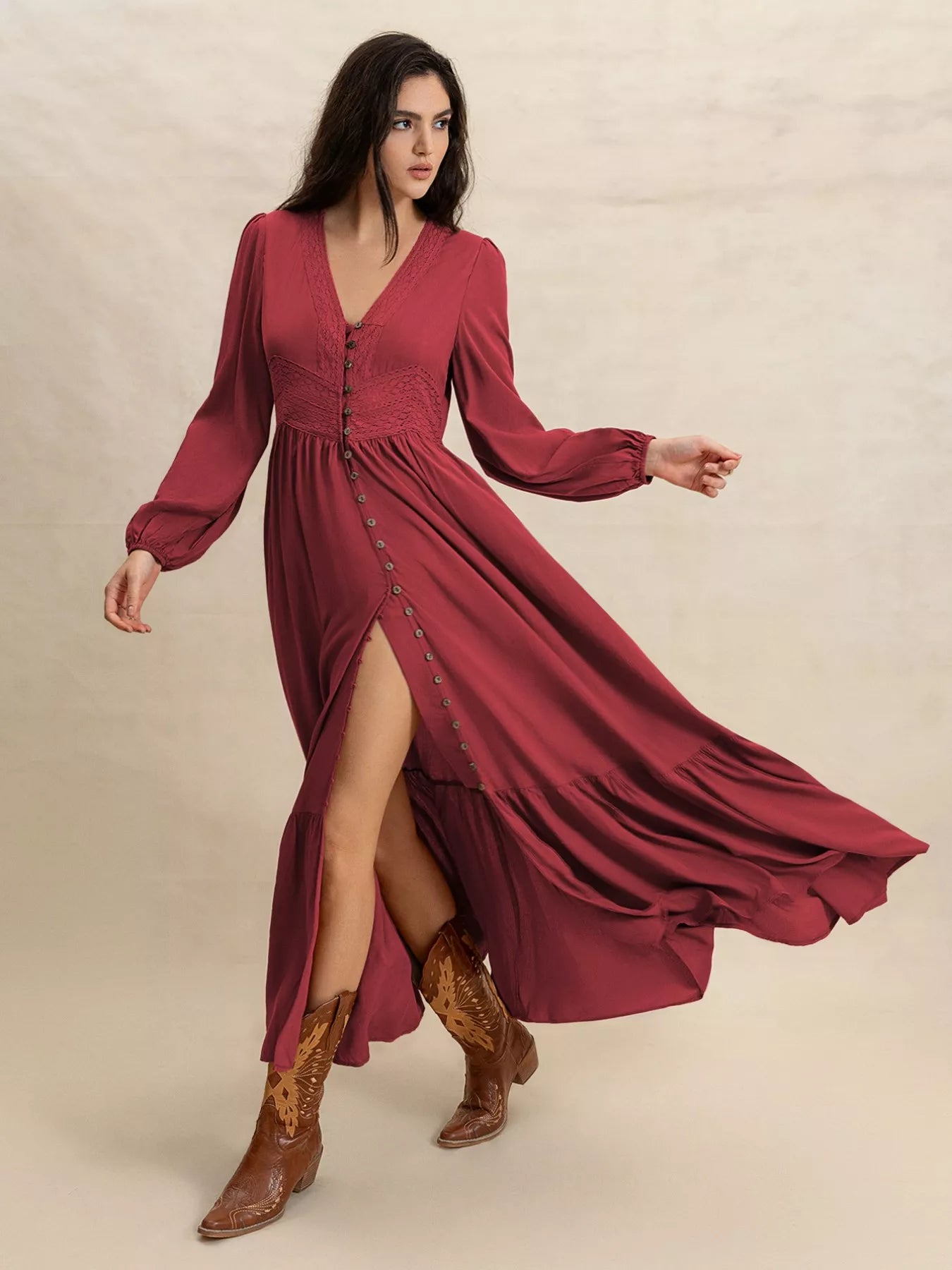 Burgundy V-neck maxi dress with flowing tiered skirt, button front, and slit hem
