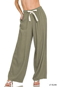 Linen drawstring pants in light olive, elastic waist with tie bow, wide-leg fit