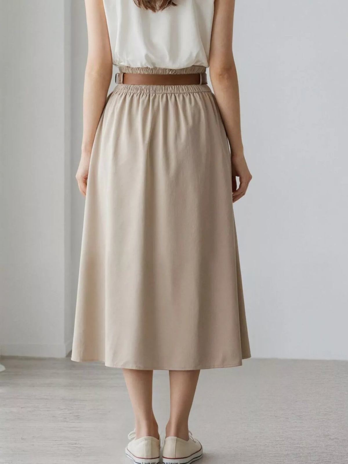 Apricot high-waisted A-line midi skirt with elastic waistband