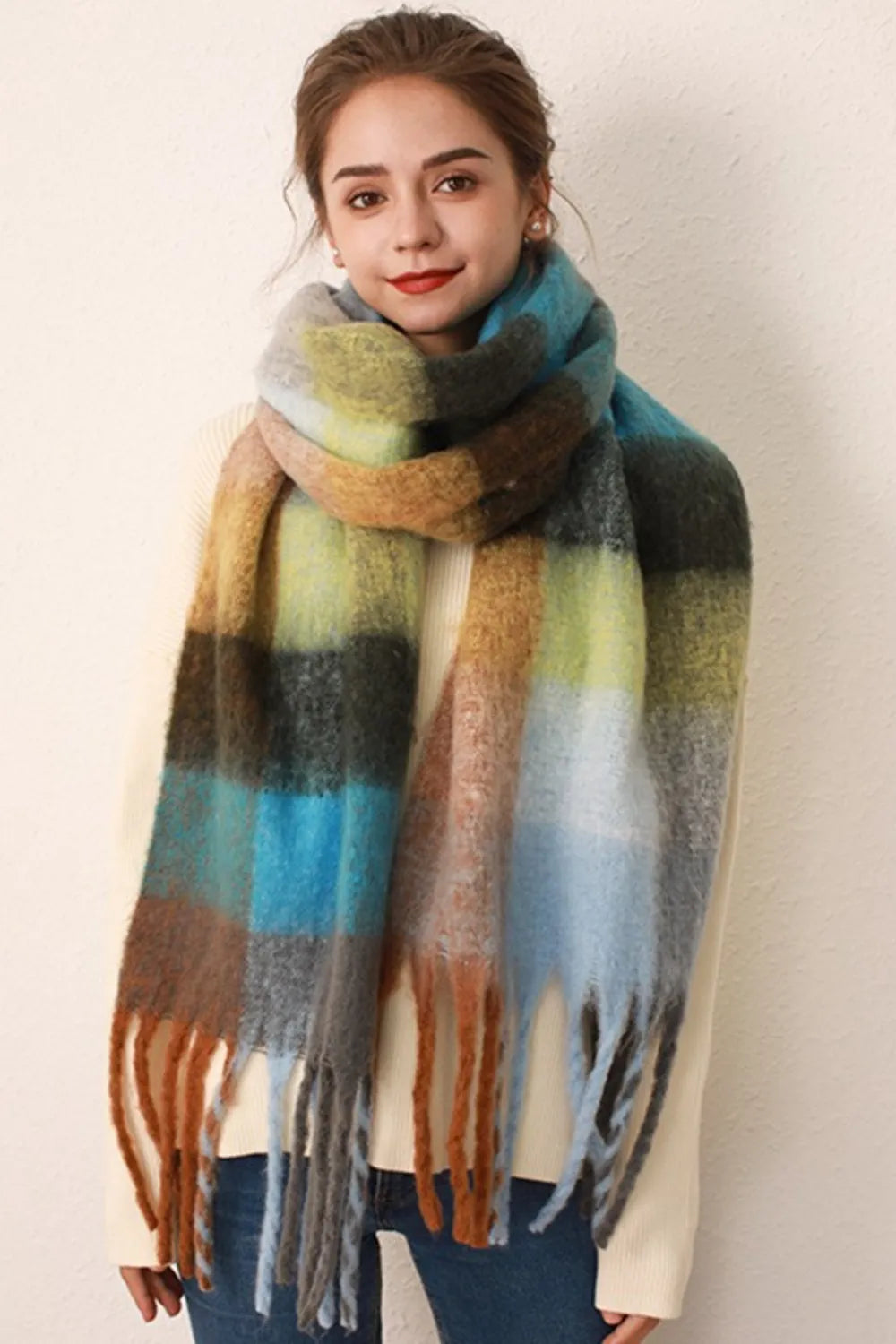 Plaid fringe scarf in blue, teal, green, and tan blocks