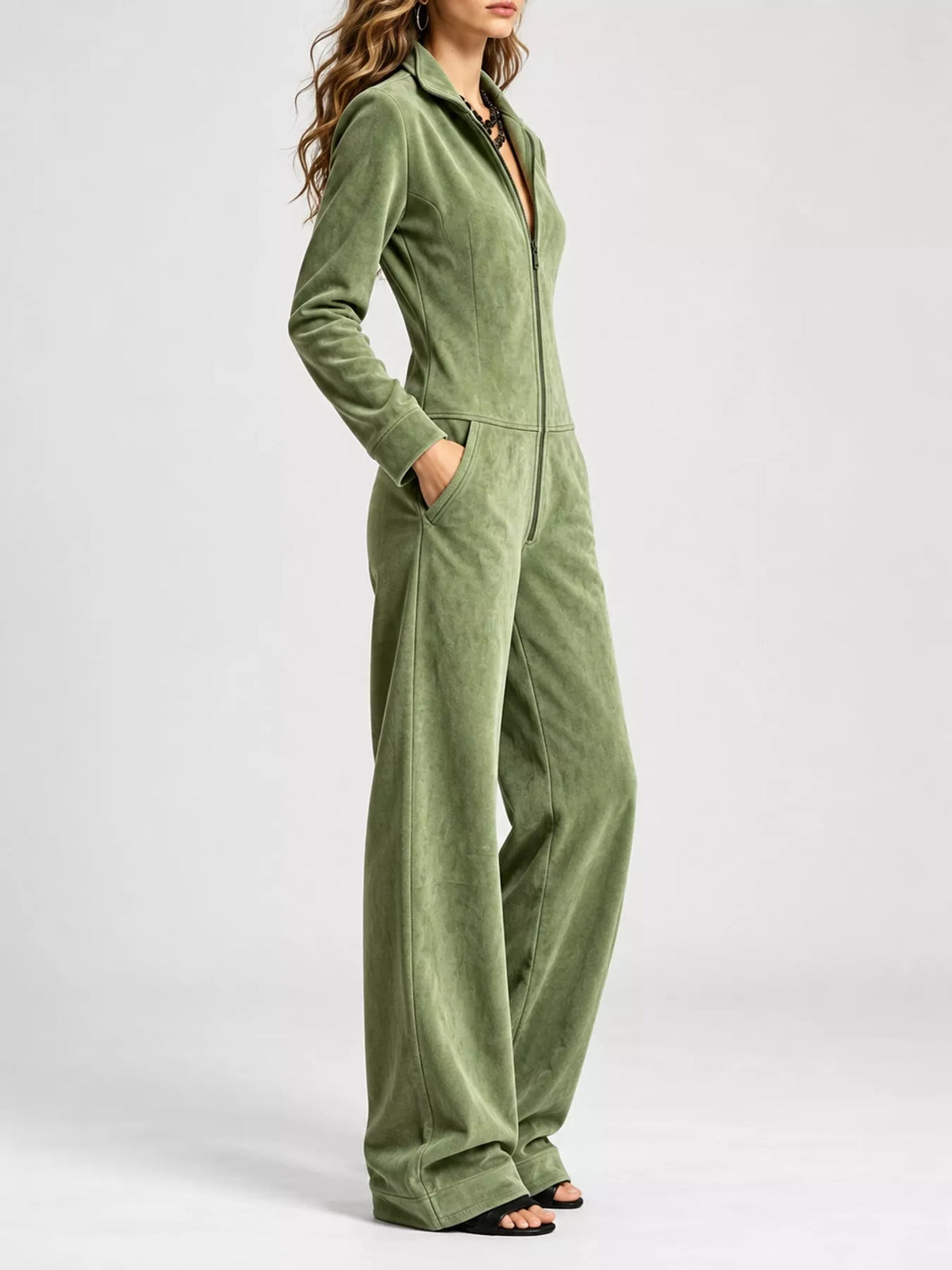 Olive green velour zip-up jumpsuit with front zipper and pockets