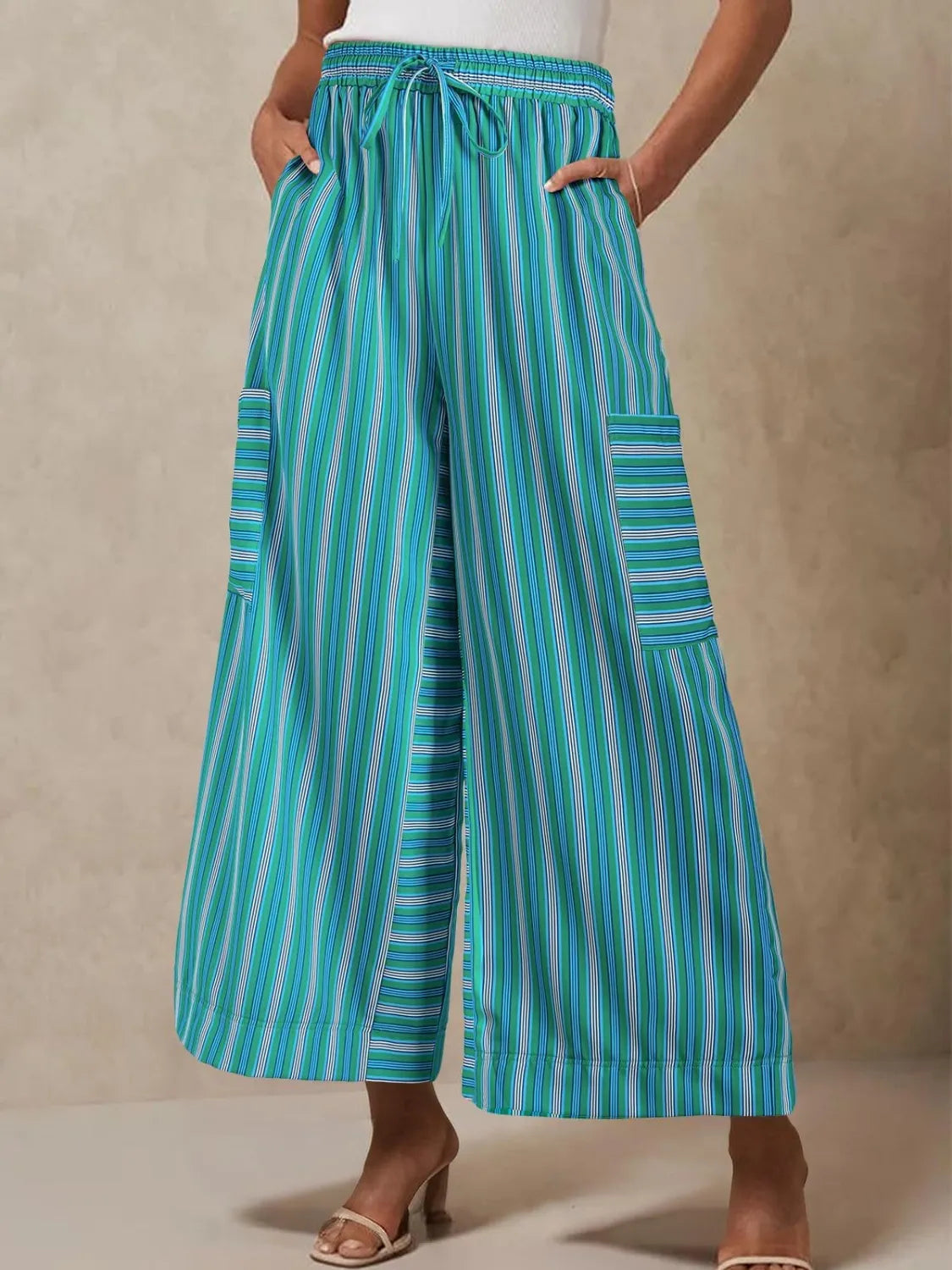 Teal striped wide-leg pants with elastic waist, drawstring, and patch pockets