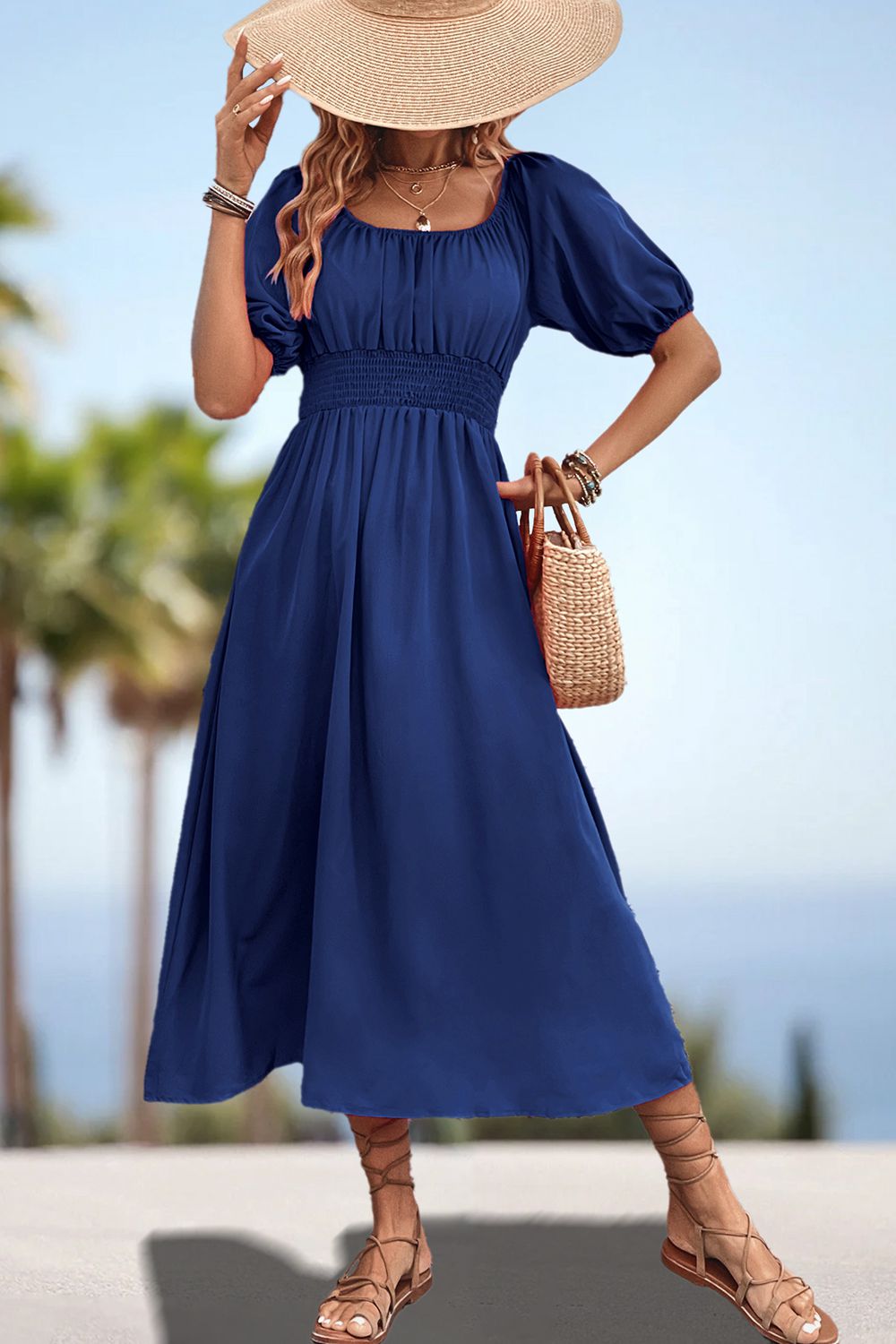 Dark blue square-neck smocked waist midi dress with puff sleeves and full skirt