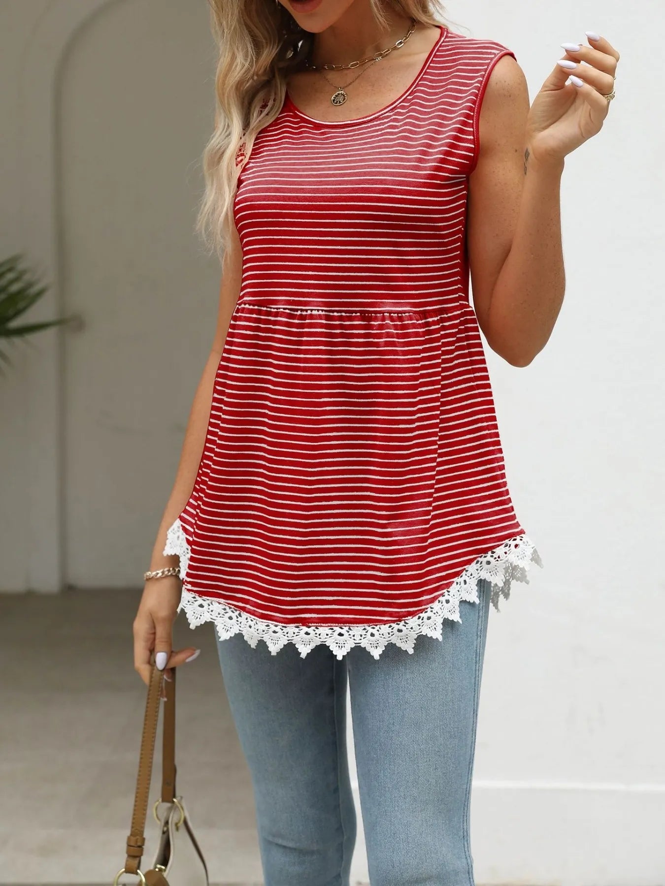 Red striped sleeveless babydoll tank with lace-trim hem and scoop neck