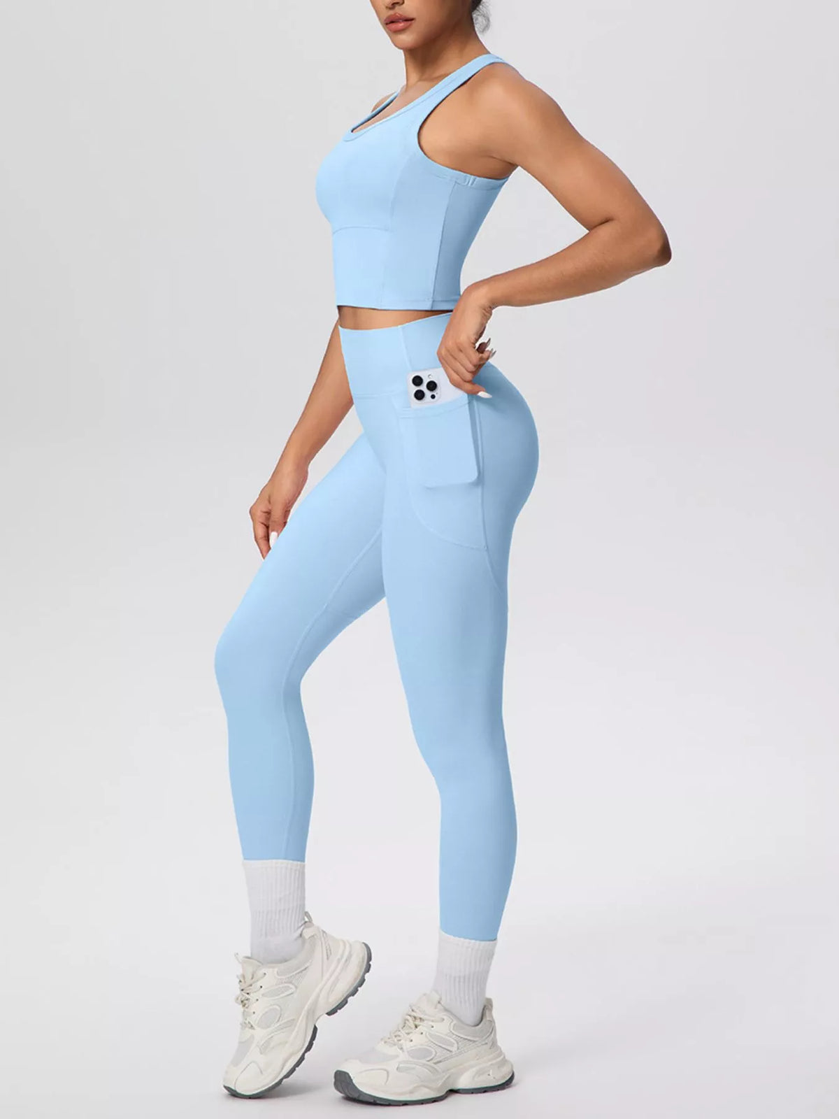 Light blue scoop-neck tank and high-waist leggings set with pale ankle panels