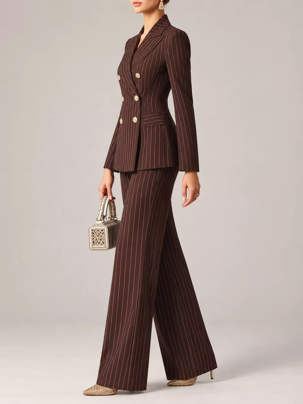 Dark plum-brown pinstripe double-breasted blazer and wide-leg pants set with gold buttons.