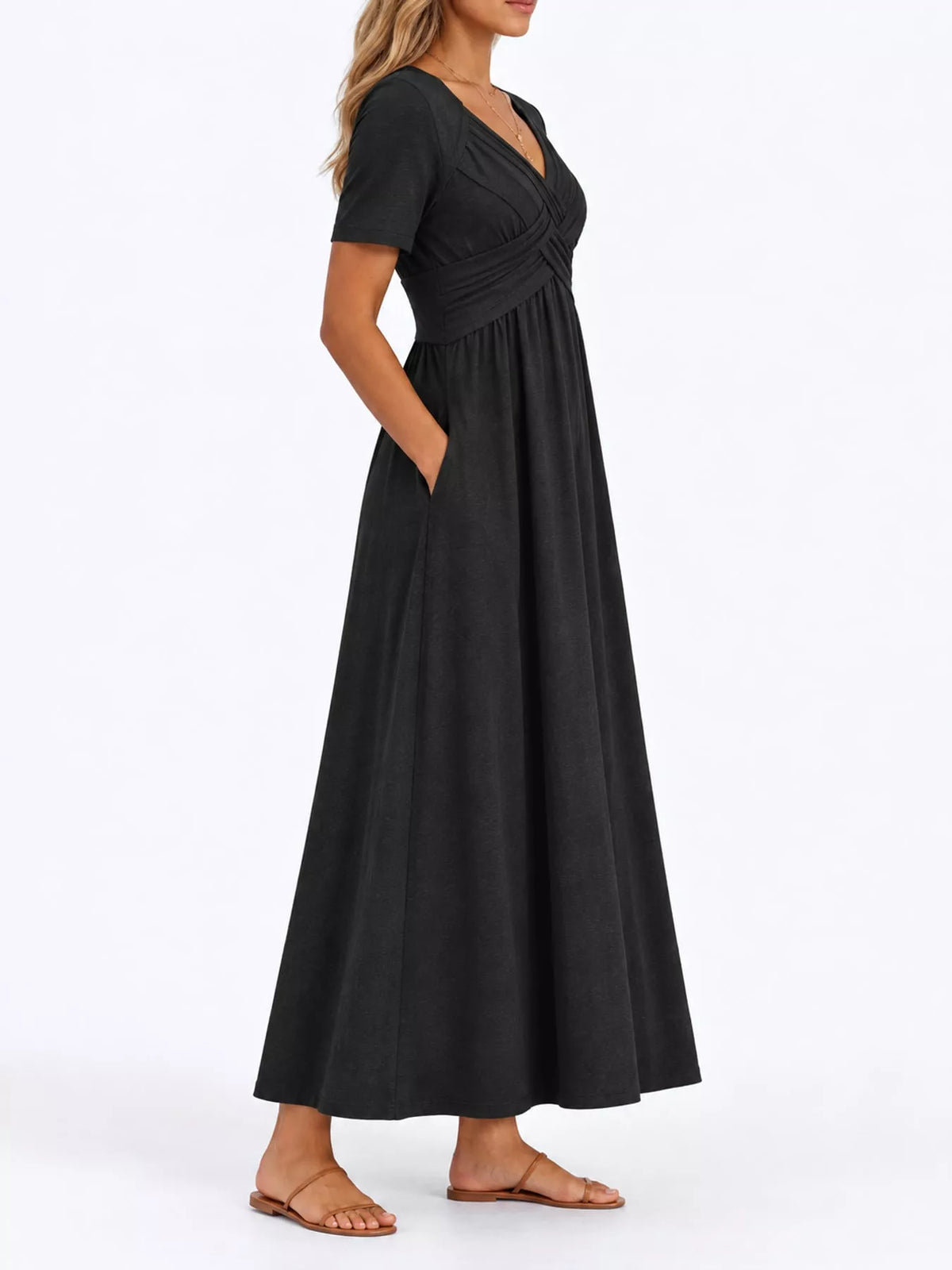 Black high-waist midi dress with crisscross wrap design, short sleeves