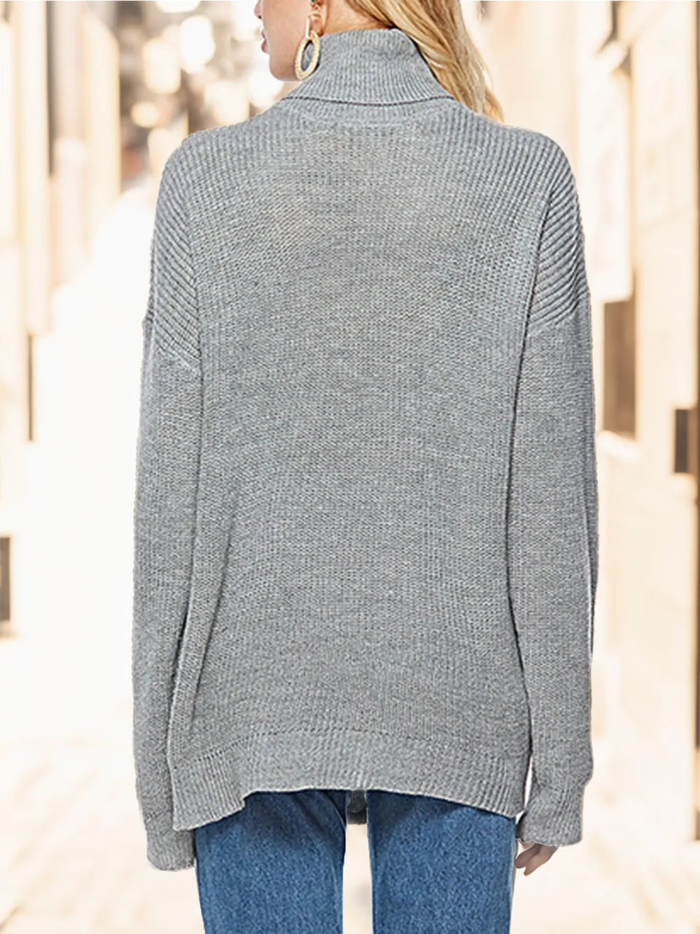 Dark gray turtleneck drop-shoulder sweater with high back neck and long sleeves