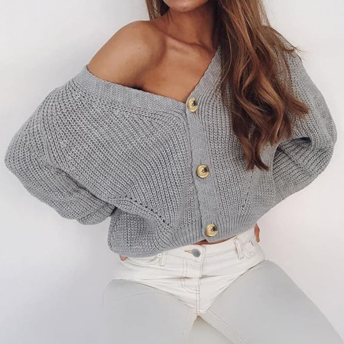 Gray V-neck button-front long sleeve cardigan with ribbed knit and gold buttons