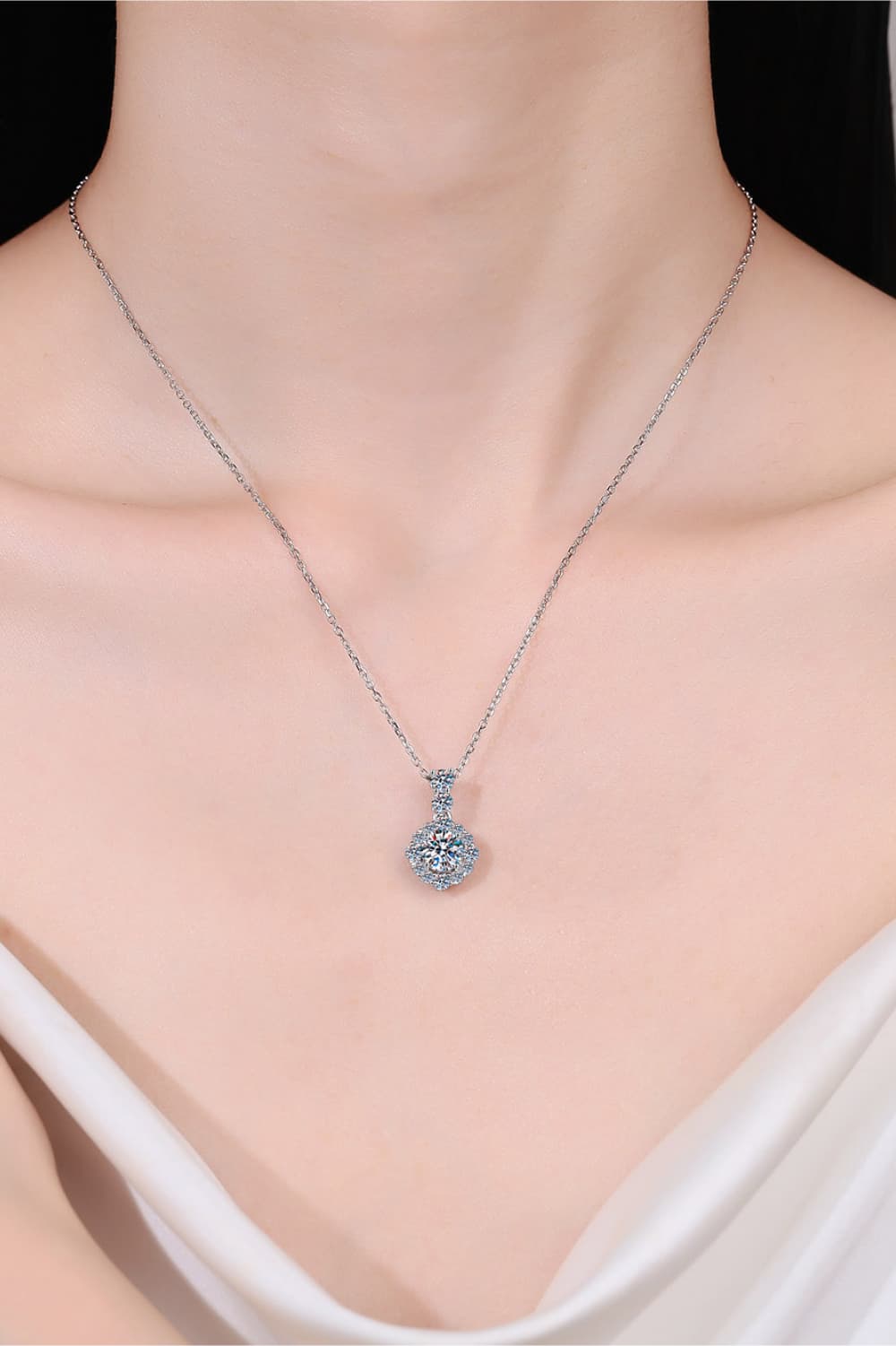 Sterling silver moissanite pendant necklace, round center stone with halo
