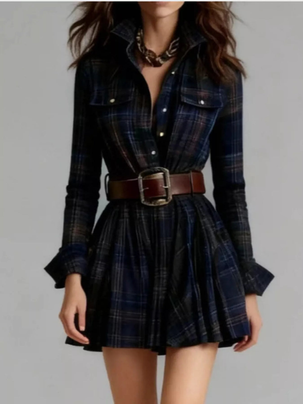 Dark navy plaid long-sleeve shirt dress with brown belt and pleated mini skirt