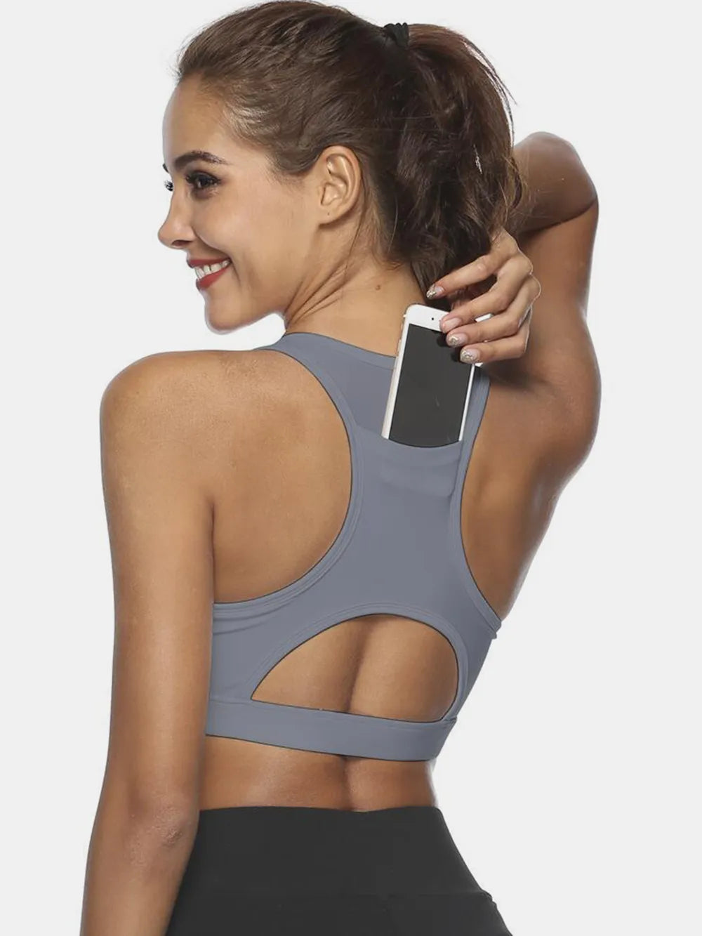 Gray active tank with scoop neck; cutout back and sporty hemline