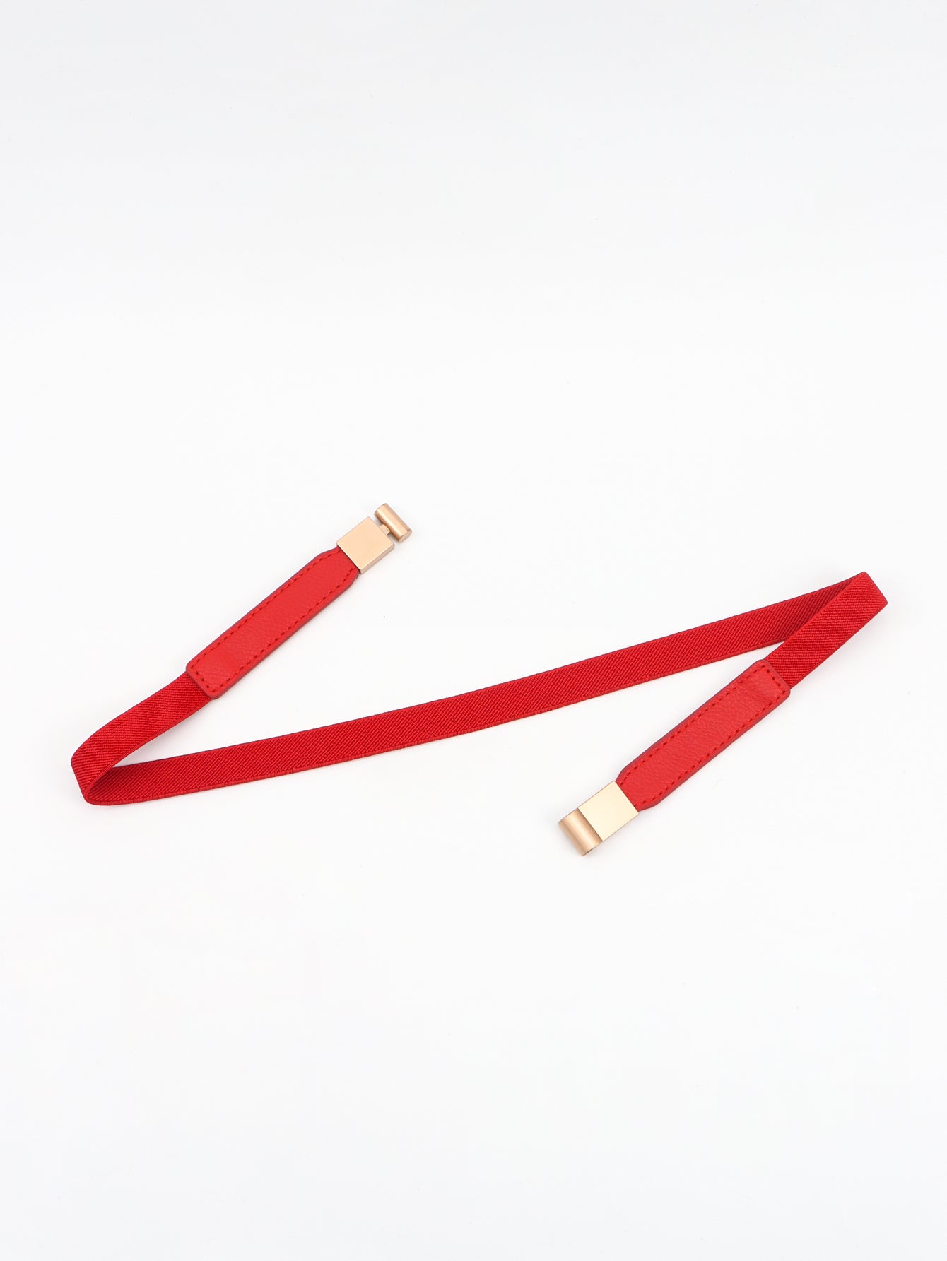 Red elastic skinny belts with gold-tone buckles, two strap views