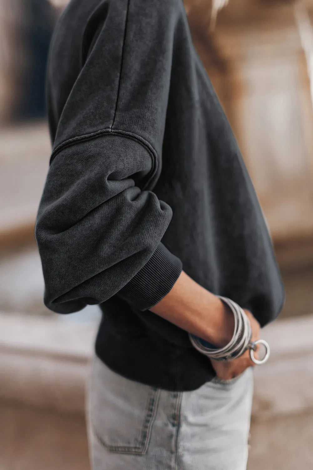 Black sweatshirt sleeve cuff with ribbed cuff detail