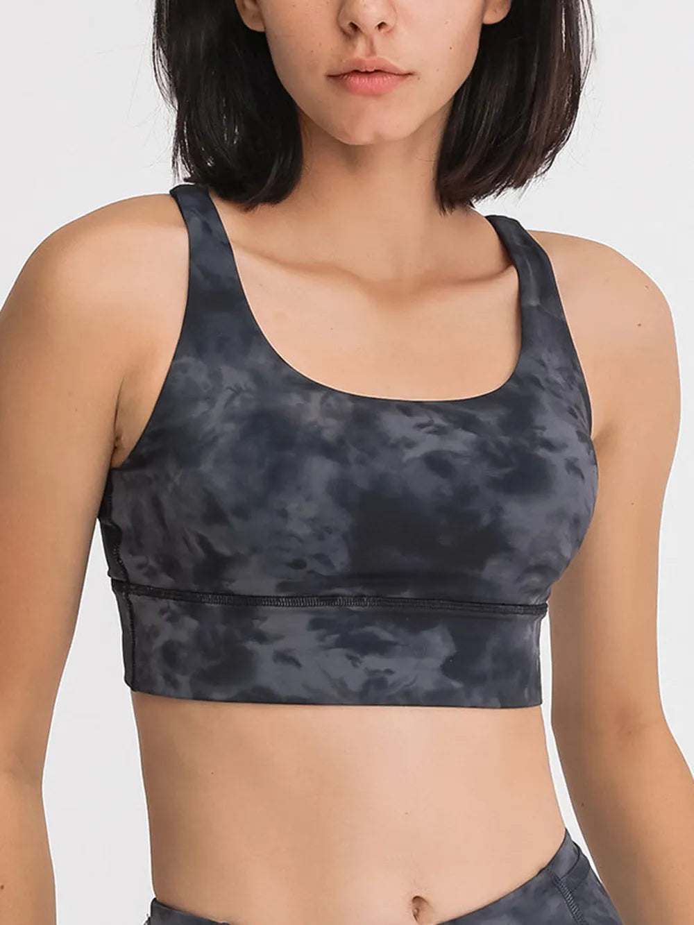 Scoop neck active tank top in dark camouflage print with racerback support