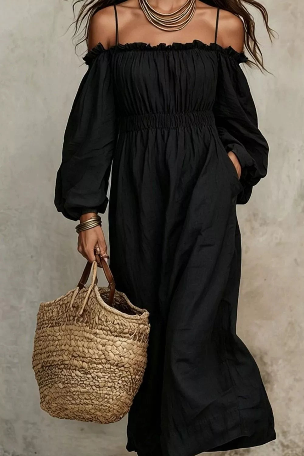 Black spaghetti strap dress with smocked bodice, gathered off-shoulder neckline, and puff sleeves