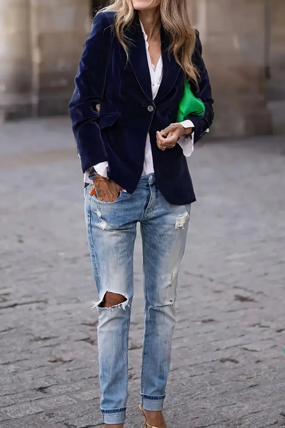 Navy one-button lapel long-sleeve blazer with button front and visible sleeve cuffs