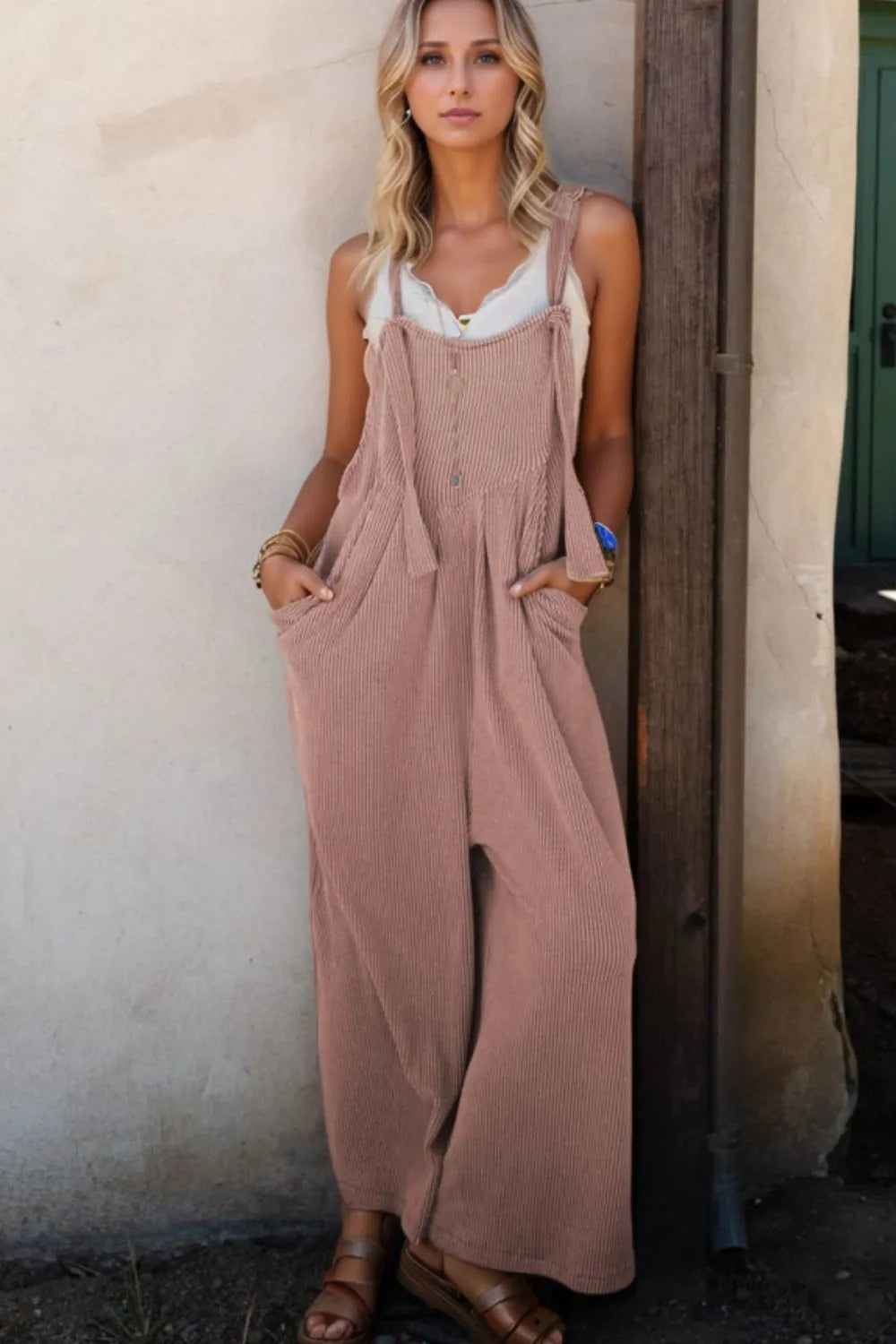 Dusty mauve corded wide-leg overalls with adjustable straps and front center seam