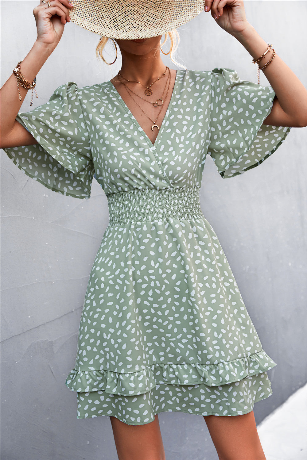 Green leaf printed smocked-waist surplice layered dress with flutter sleeves