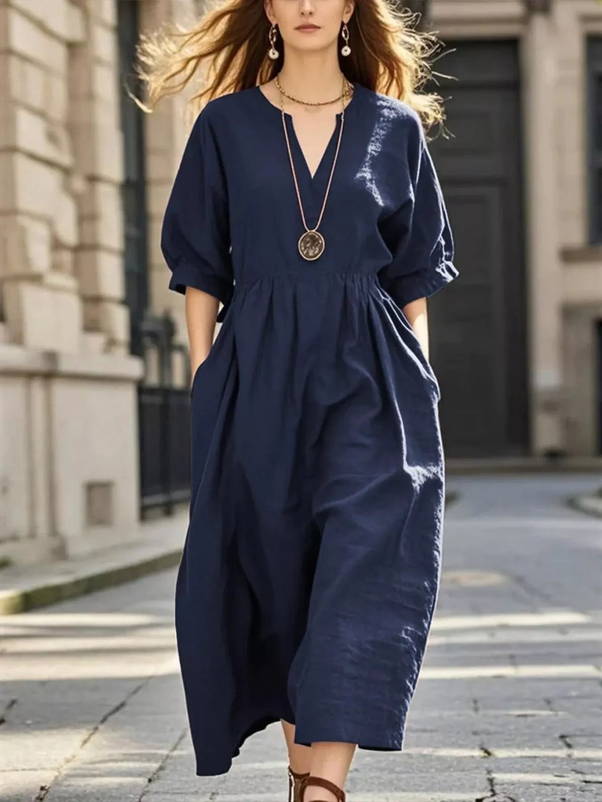 Dark blue notched V-neck midi dress with half sleeves and gathered waist