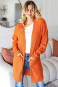 Haptics rust open-front textured cardigan with pockets and long sleeves