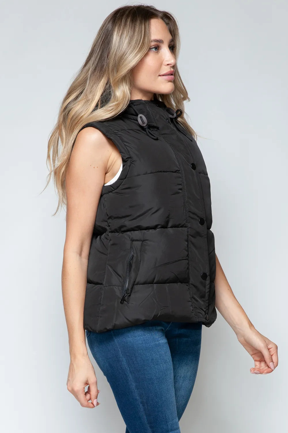 Black hooded puffer vest with drawstring, sleeveless side profile