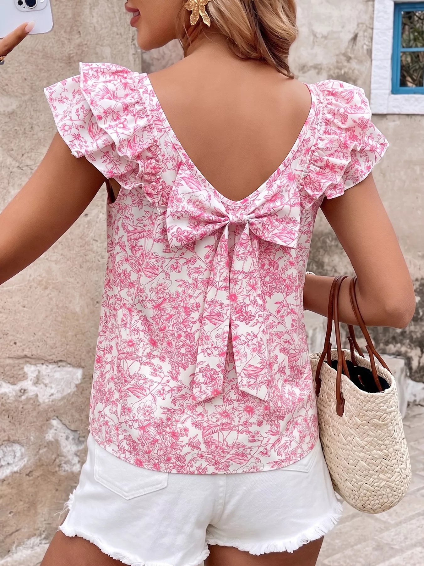 Cedar & Moore Floral Print Ruffle Sleeve Blouse in pink floral pattern with bow-back detail