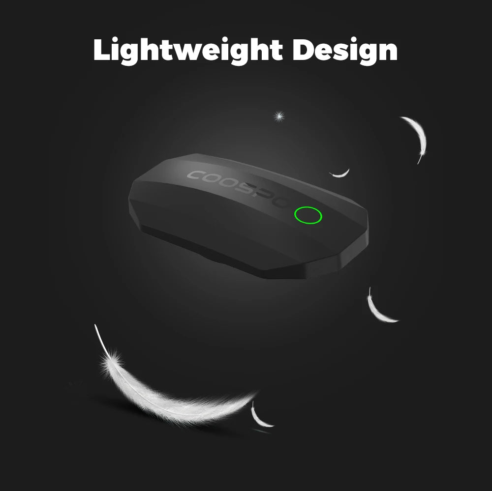 Lightweight black heart rate monitor sensor pod with green indicator ring