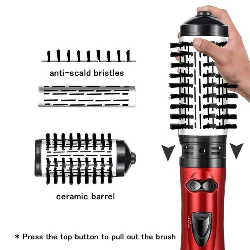 Red hot air hair dryer brush with black rotating bristles and detachable head