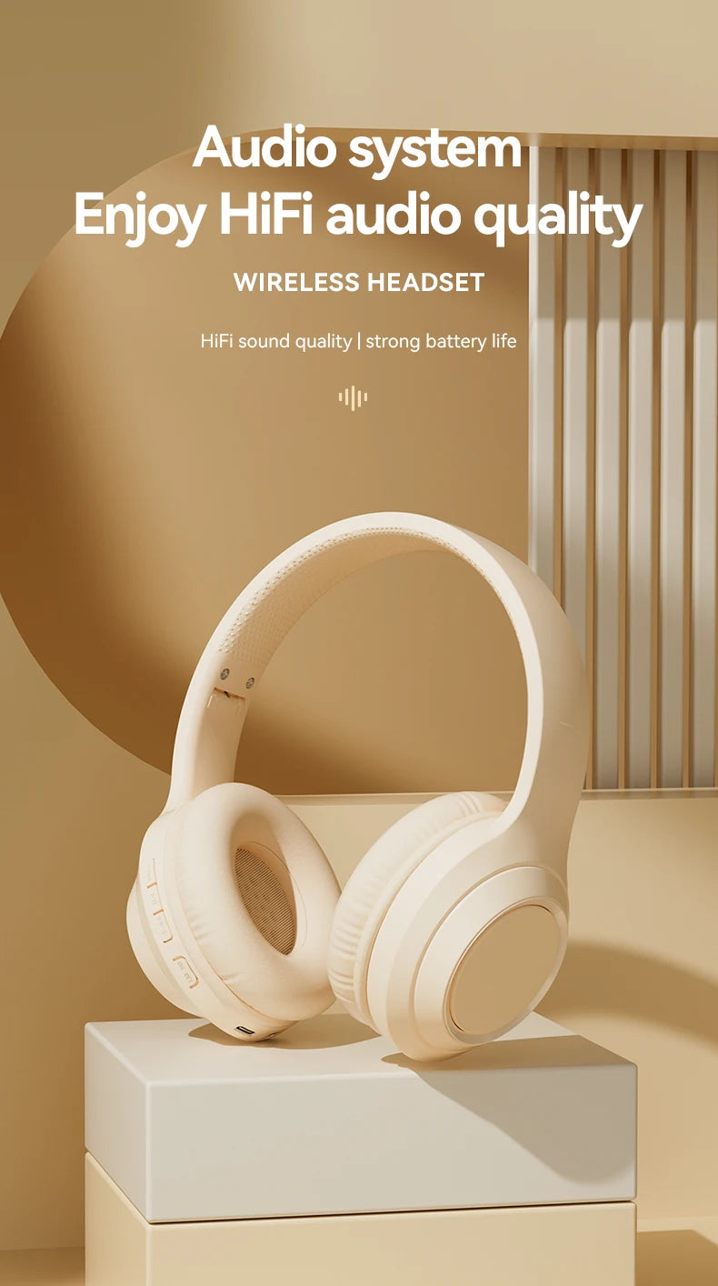 White over-ear wireless headphones with cushioned earcups and curved headband.