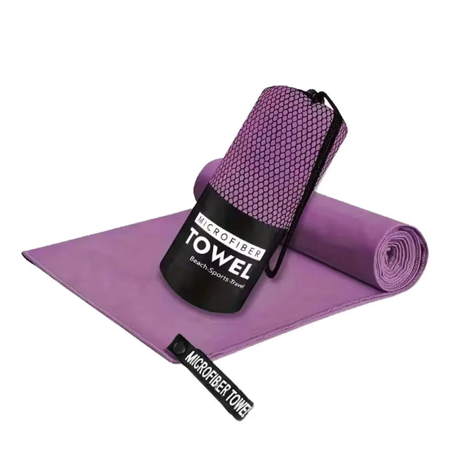 Purple microfiber gym towel set with pouch and matching carry bag
