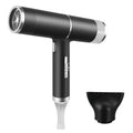 Black hair dryer with concentrator nozzle and two attachment tips included