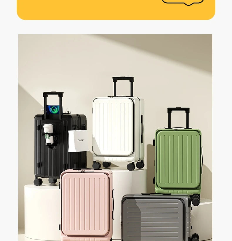 Group of wheeled suitcases in white, black, pink, and green colors with handles