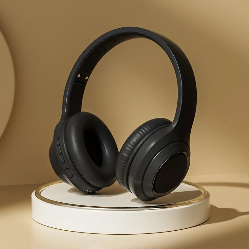 Black over-ear wireless headphones with padded ear cups and adjustable headband