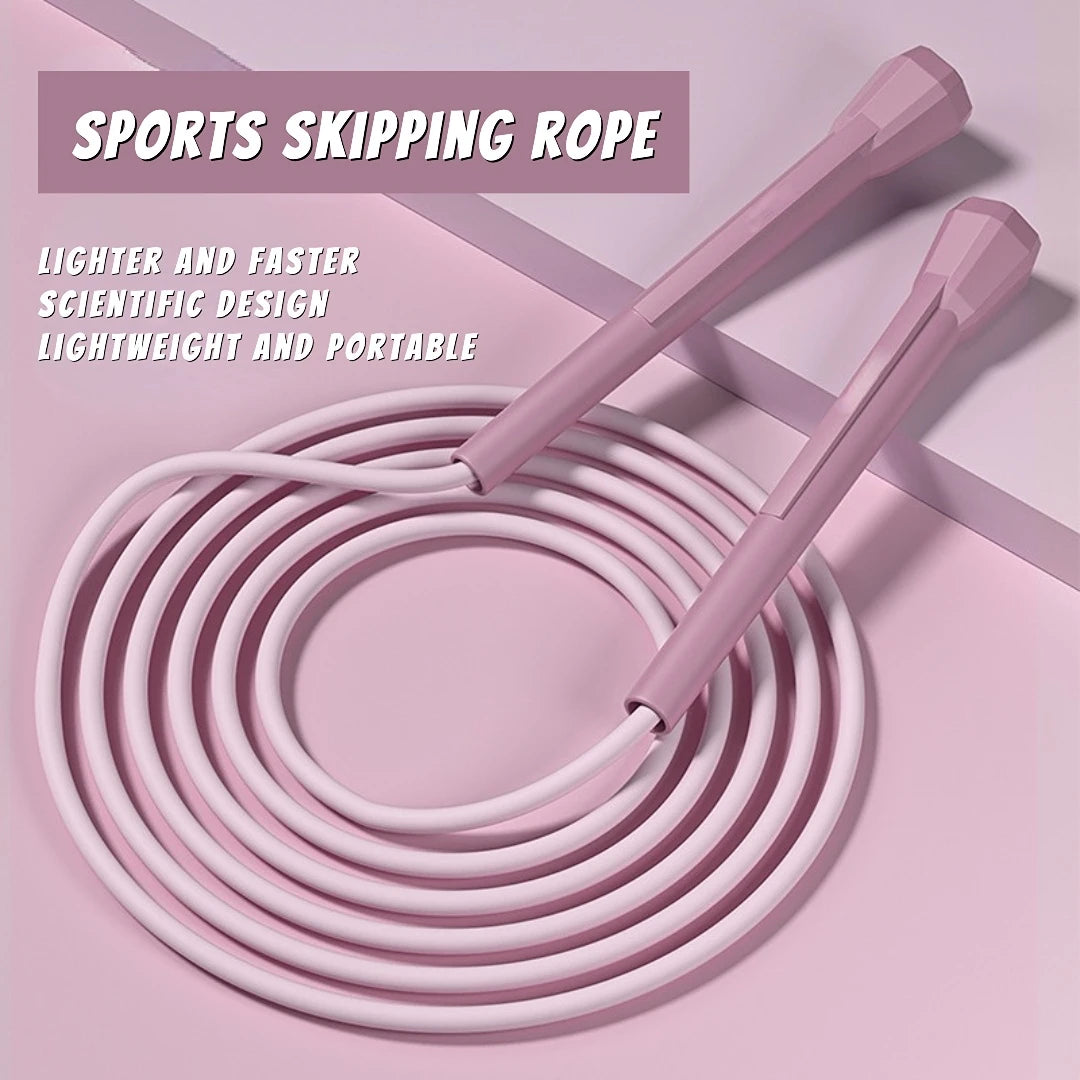 Lightweight pink speed jump rope with two foam handles and coiled cable