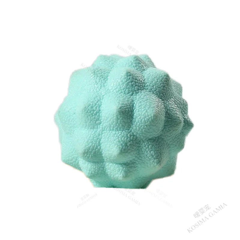 Textured massage ball, teal color, for myofascial release and deep tissue relief