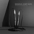 Jump rope set with dark gray handles, coiled cable, and ball-bearing swivel, in upright display