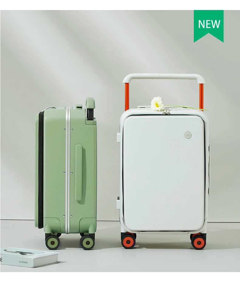 White carry-on suitcase with orange trim beside light green carry-on suitcase with wheels