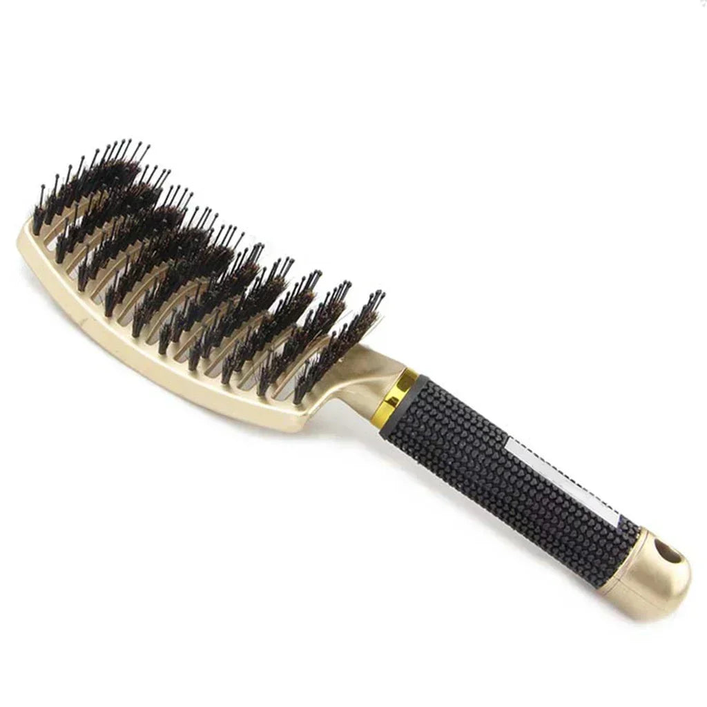 Boar bristle detangling hairbrush with gold-toned cushion and black textured handle