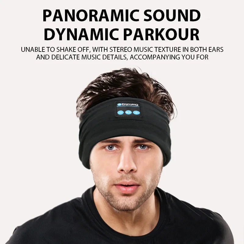 Black sleep headband headphones worn on head with visible side control